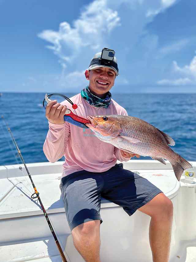 Eric Castillo 25 miles offshore - 24.5" mangrove snapper, caught on live pin perch while fishing a shipwreck