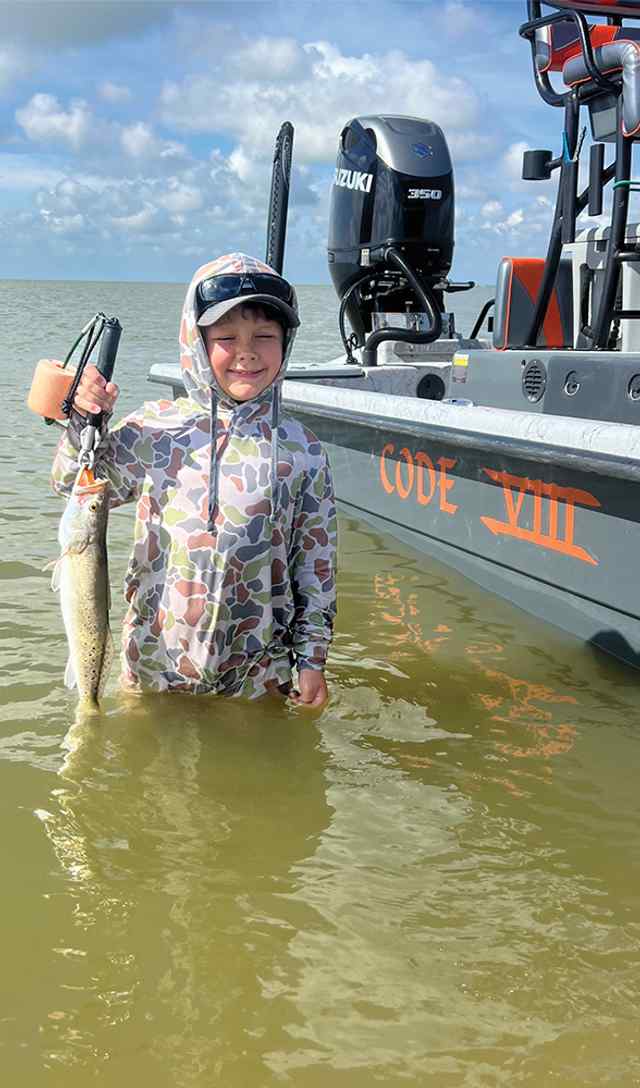 Dylan Strahan, Jr. East Matagorda Bay - 19" trout, 1st time wade fishing!