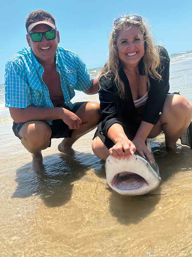 April Thompson with Aaron Stuart Matagorda Beach - first bull shark! CPR