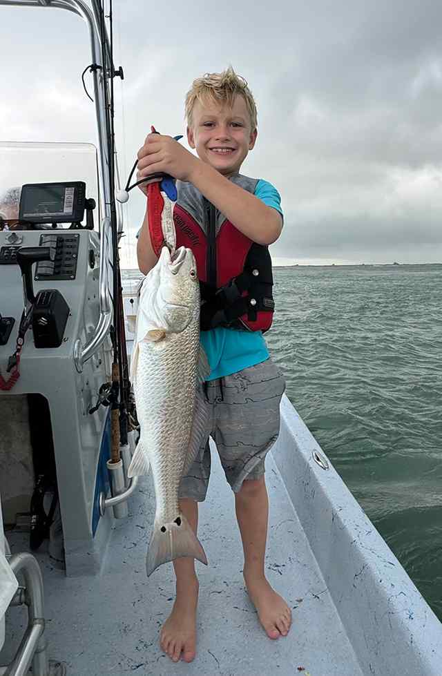 Grey Vlaskovits POC - 27" first redfish!