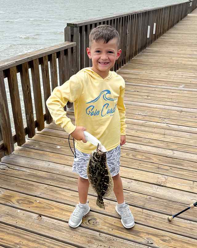 Cruz Castillo Goose Island Pier, Rockport - 18" first saltwater catch! CPR