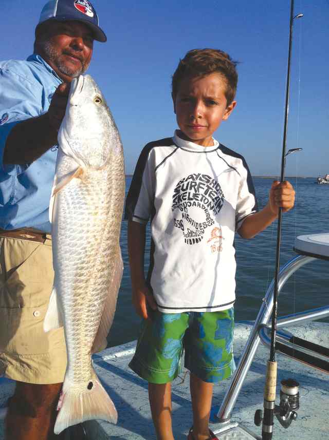 Eduardo Coronado South Padre32&quot; first redfish!