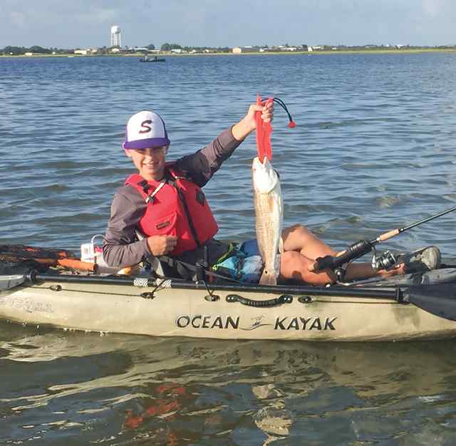Connor Winkenwerder Boggy Bayou, first time kayaking!keeper redfish