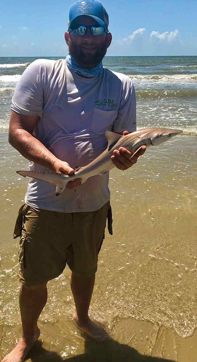 Dusty Brown Port Aransas surf - 23" blacktip, first shark!