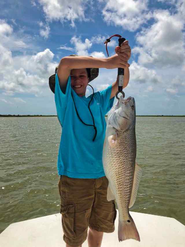 Dylan Goodrich 28" first redfish!