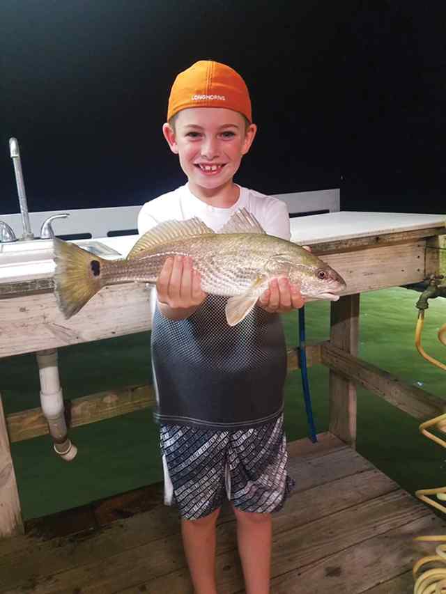 Kingston Faldyn Shoalwater Flats Association (private pier) - first redfish! CPR
