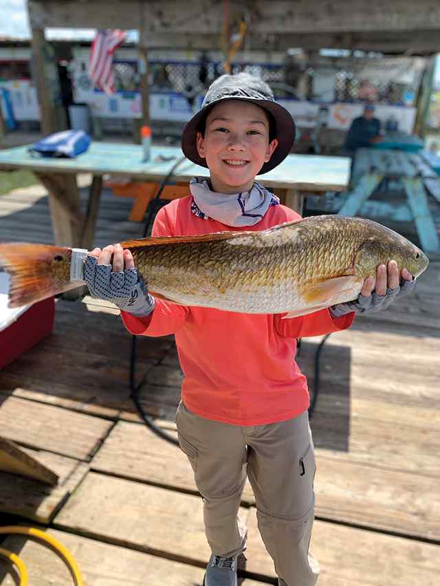 Brendan Gonzales East Galveston Bay - 31" redfish