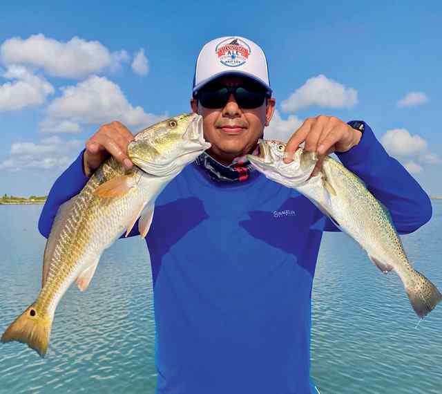 Jaime Quiroga Lower Laguna Madre - 23" redfish & 19" speckled trout, caught on a topwater while wade fishing