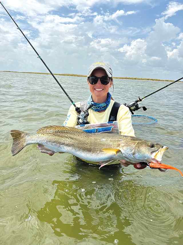 Chrystal Watts Lower Laguna Madre - 27" trout CPR, caught on 6" coastal brew baits dart orange crush color, 1/16oz. Salty Head jighead, Laguna Salt Custom Rod, Coastal Fishing Gear - Wade right system