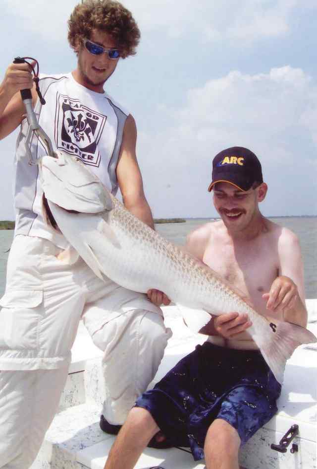 Tim Armstrong with friend, Dustin Newcum 29lb redfish