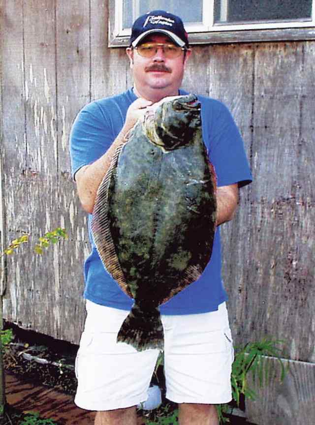 Danny Eddins Set a new Corpus Christi Bay water body record for southern flounder with this 26&quot; 11lb flatfish.