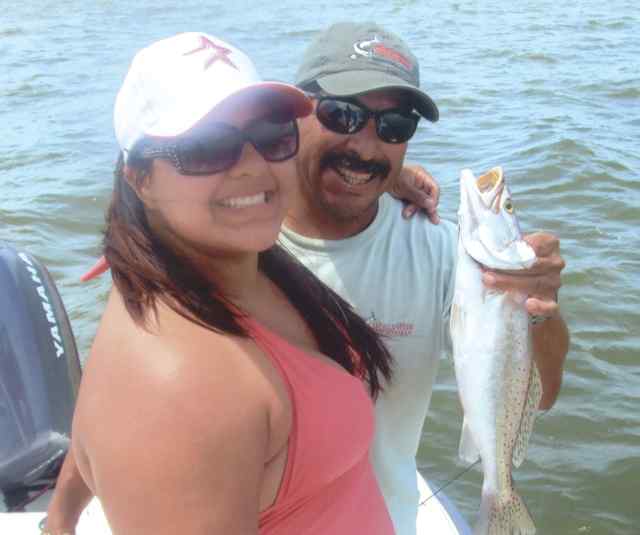 Melanie Cortinas East Matagordahaving a good time fishing with her father