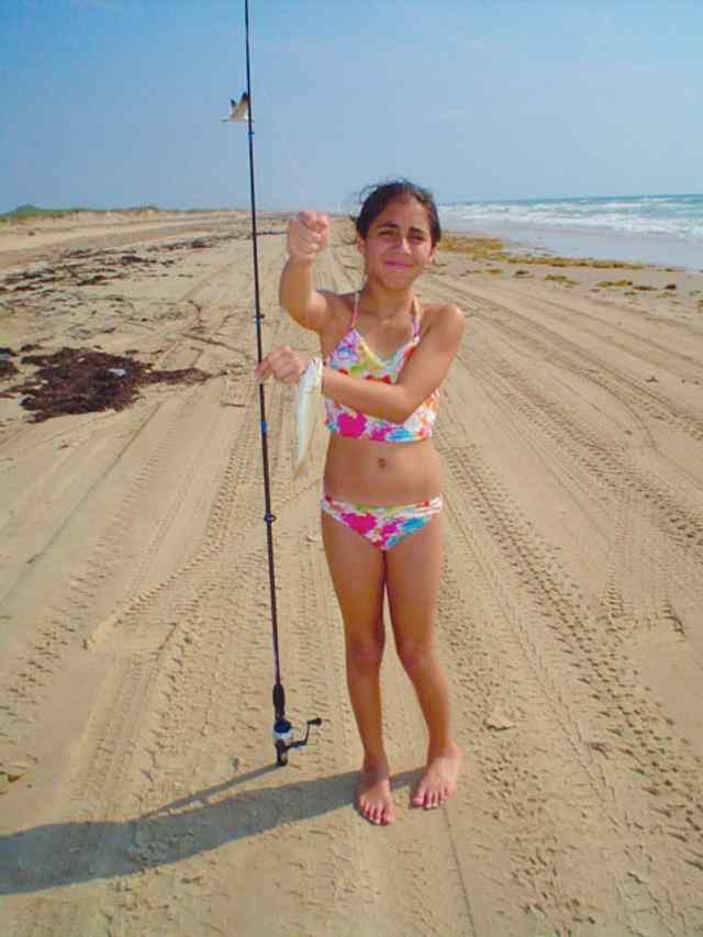 Alexis Canales Baited, casted, landed and released all by herself for the first time while surf fishing with dad, OsoObsessed, at PINS.