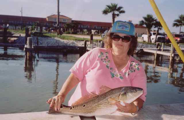 Colleen Hilton Port O'Connor jettiesfirst big redfish!