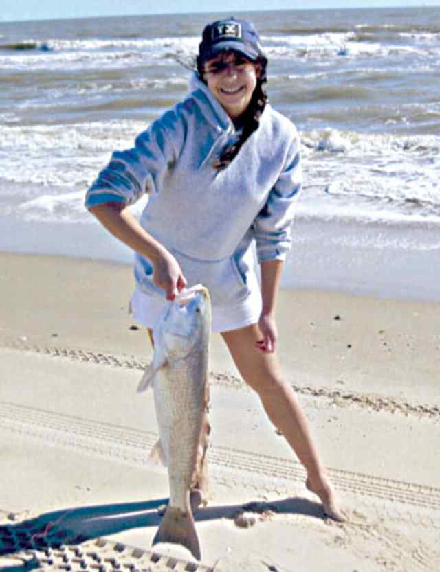 Nicole Gavlik Matagorda surffirst keeper redfish!