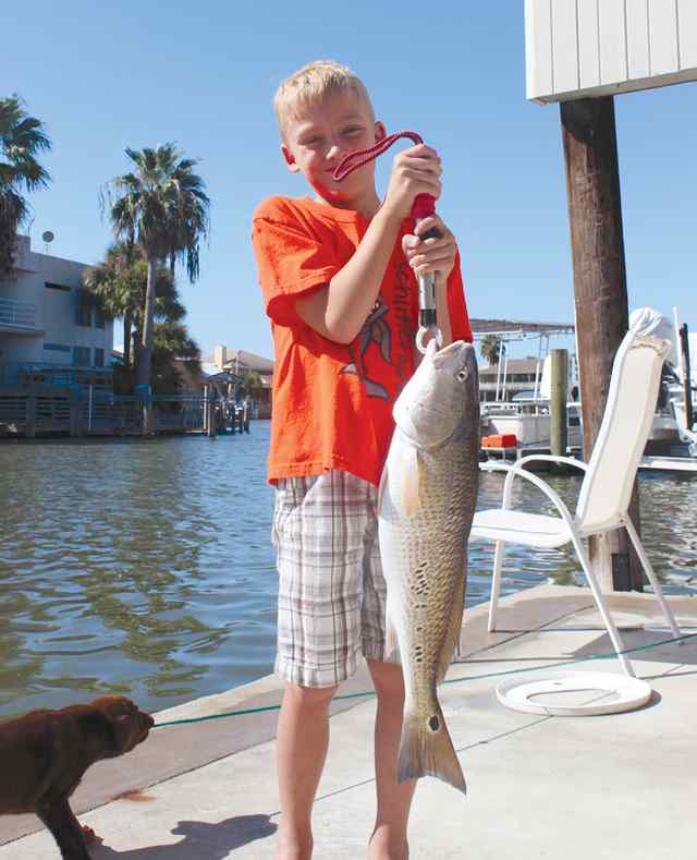 Trevor Seerden & Bella Rockport25&quot; first redfish!