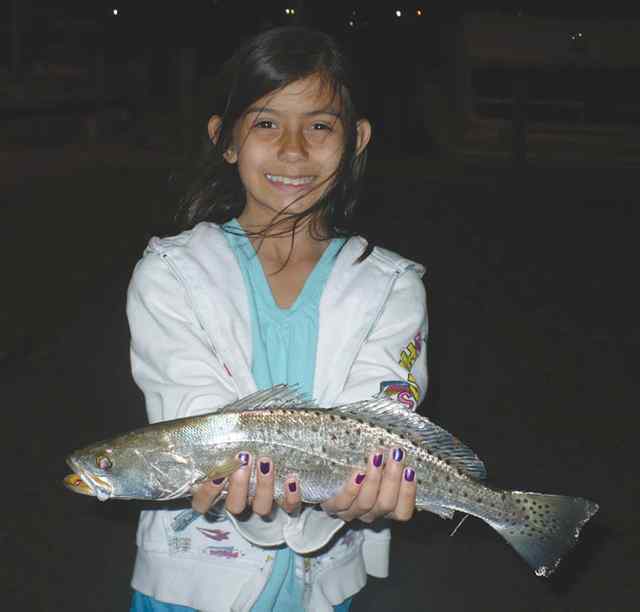 Faith Gonzales Rockport17&quot; first keeper trout!