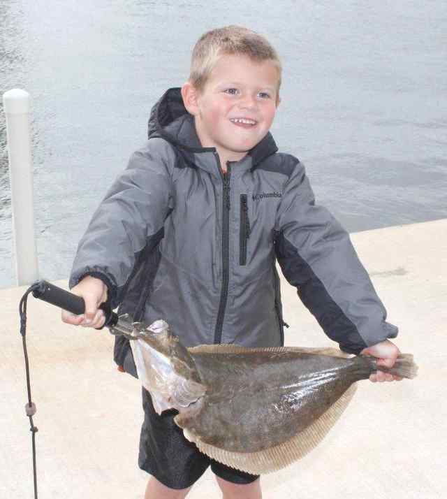 Dax Satterwhite Jamaica Beach23.75&quot; 4 lb first flounder!