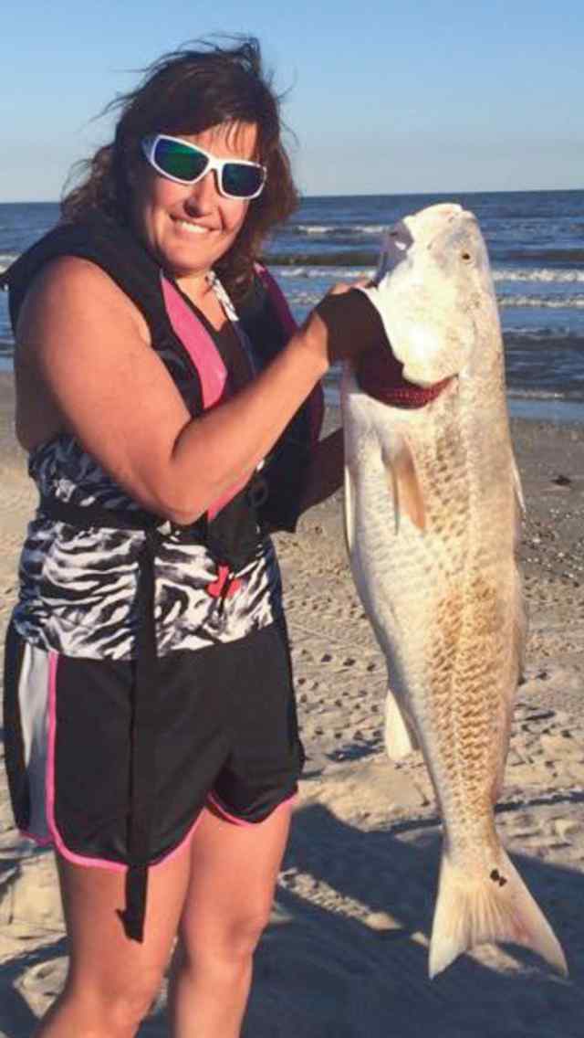 Felicia Beck Crystal Beach, fishing from her kayak for the second time38&quot; redfish