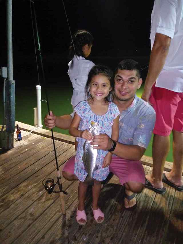 Camila Mendoza Arroyo City - 18" first speckled trout!