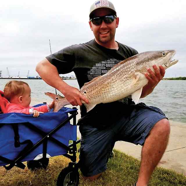 Wes Cole Port Aransas - first bull red! CPR, caught on cut mullet