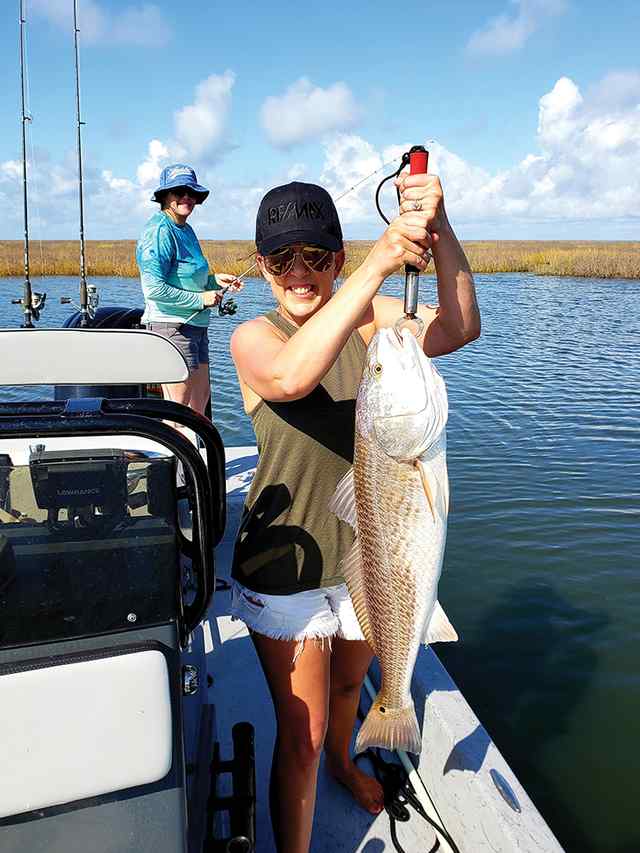 Lin Hutzenbiler Port O'Connor - 35" personal best redfish! CPR