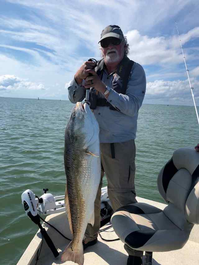 Max Parrish Port O'Connor "Big Jetties" - 46" bull red CPR, caugh on frozen Spanish sardines