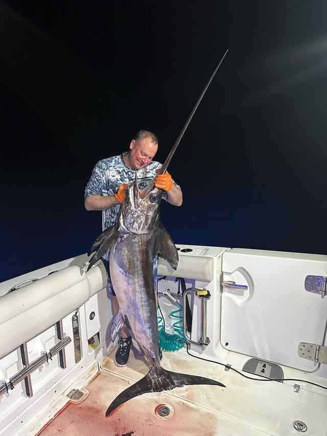 Ryan Chancey Off the coast of Surfside - 215 lb swordfish
