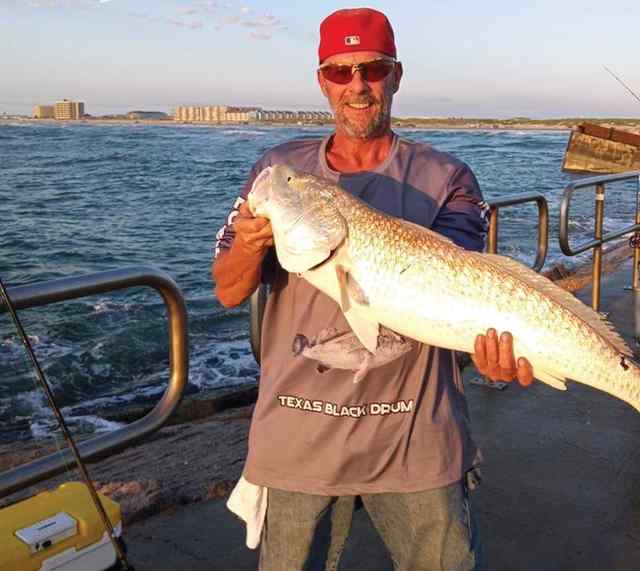 Jason Crocker South Packery Jetties - 36" redfish, tail bitten off by shark while reeling in