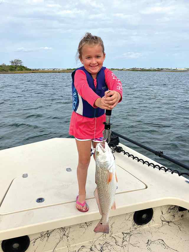 Annie Mae Olinick Redfish Bay - 22" first redfish!