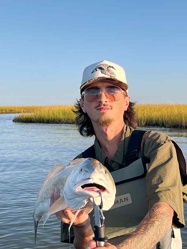 Tyler Byrket Chocolate Bay - 27" redfish, caught on the goat Mansfield knocker