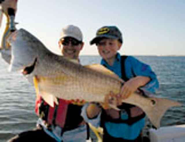 Danny & Brodie Daniel Port O'Connor16lb redfish CPR