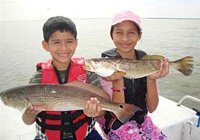 Marcus & Amber Molina Laguna Atascosa22&quot; redfish &amp; 22&quot; trout