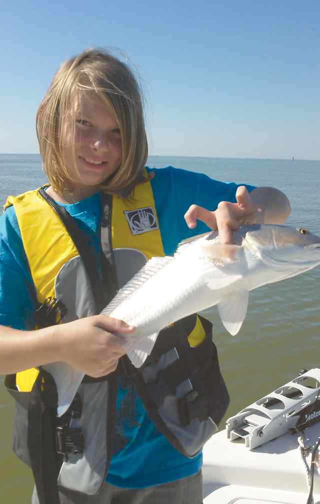 Desi Denofa Trinity Bay22&quot; first redfish!