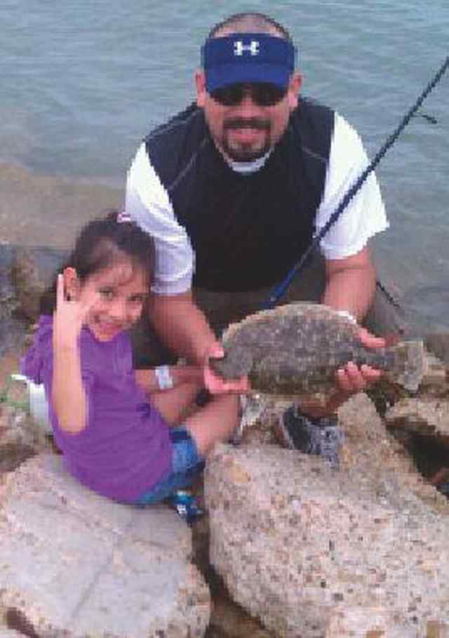 Rainy Chavez Dickinson Bayou23&quot; first redfish!