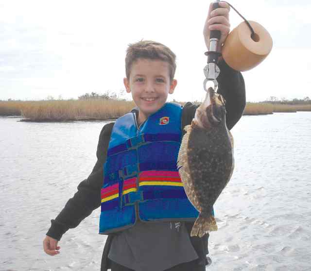 Dylan Givens Neches River13&quot; first flounder!