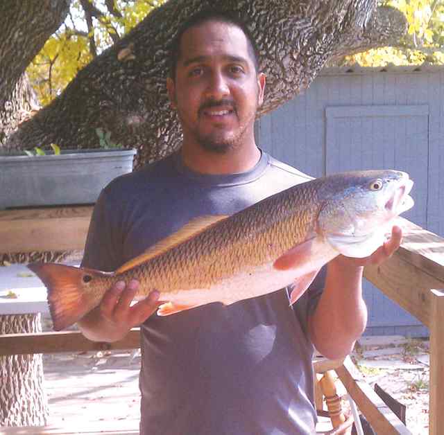 Jose Rodriguez Wallisville Lake27&quot; first redfish!