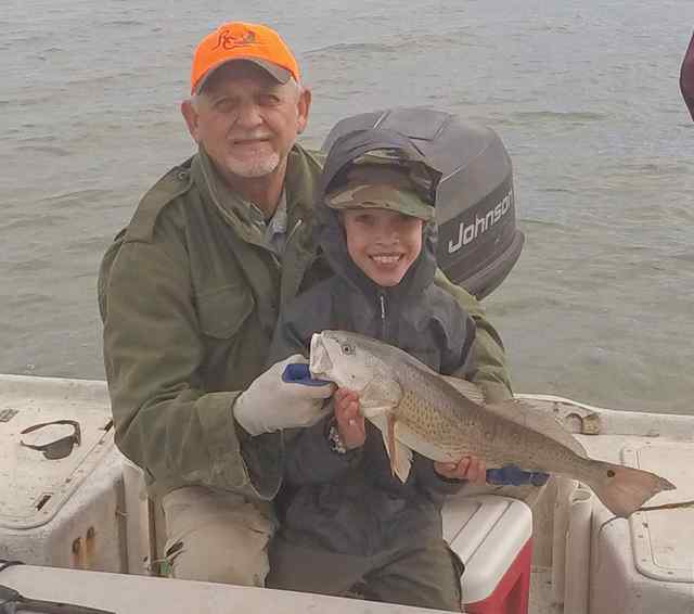 Andrew Dybala & grandfather, David Dybala San Antonio Bay22.5&quot; first redfish!