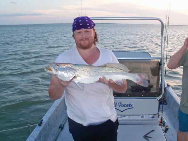 Jon Smith Lower Laguna - 28.5" trout, caught on red & white brown Devil Eye