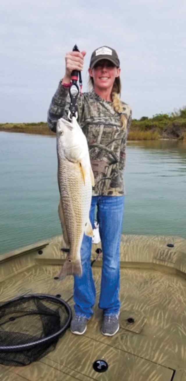Melanie Grantham Inner Coastal Canal, Rockport - 31.5" first bull red!