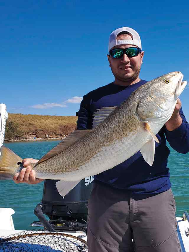 Andrew Kyrisch Corpus Christi - 34" redfish CPR, fishing with Mom & Dad