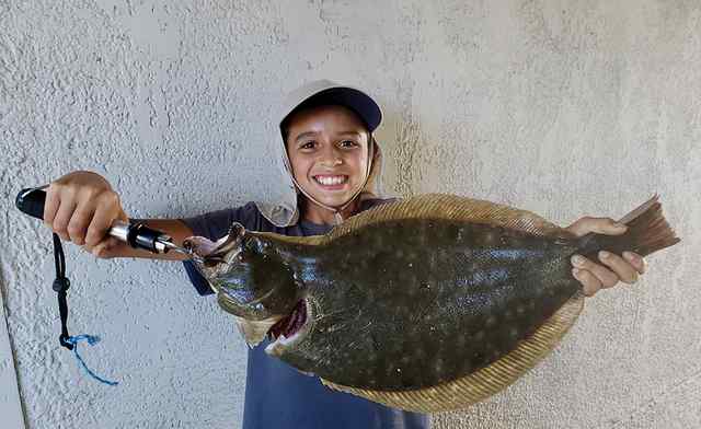 Micah Garcia Galveston Bay - first flounder, caught on cut mullet