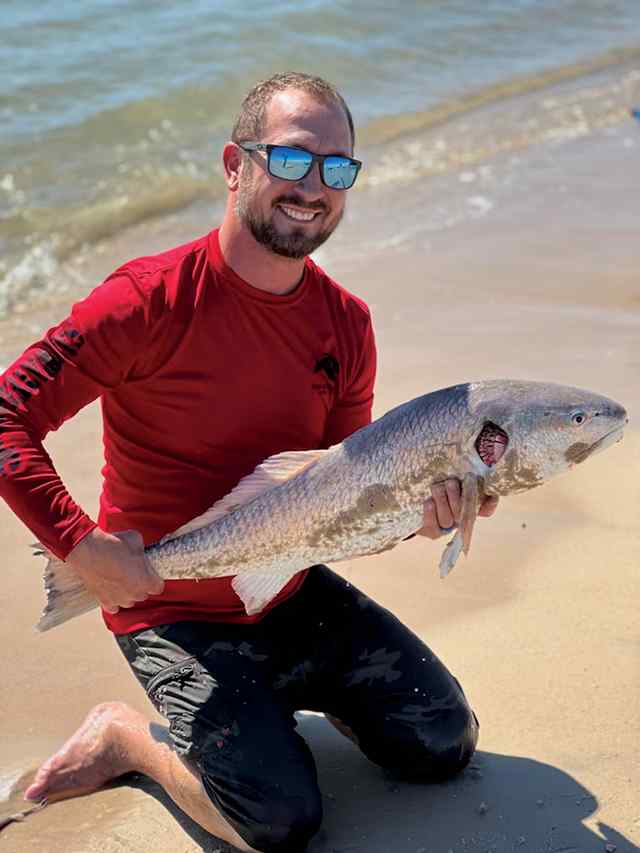 Derrick Lovin Matagorda Beach - 32" redfish CPR