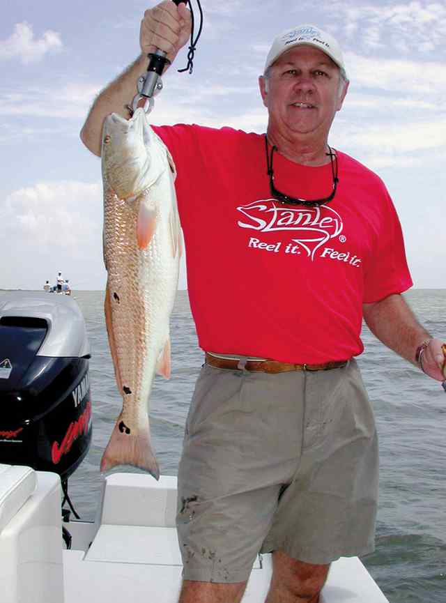 Ken Chaumont Sabine Lake8 lb redfish, caught on a Stanley Wedgetail glow with chartreuse tail