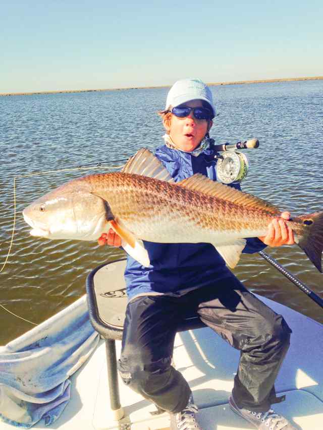 Flynn Kenney Louisiana20 lb first redfish on fly!