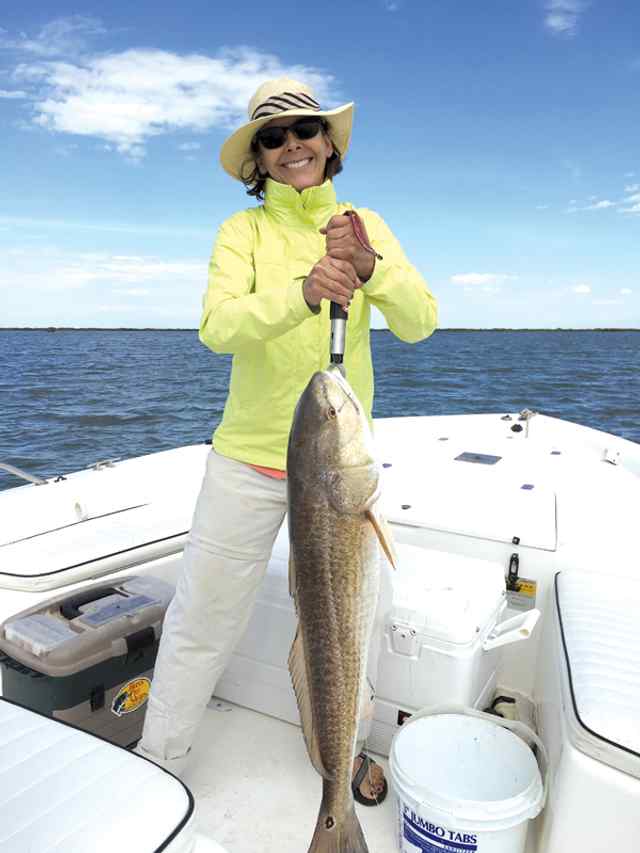 Patti Wilhite Port Aransas - 38" first bull redfish! Photo contest winner!