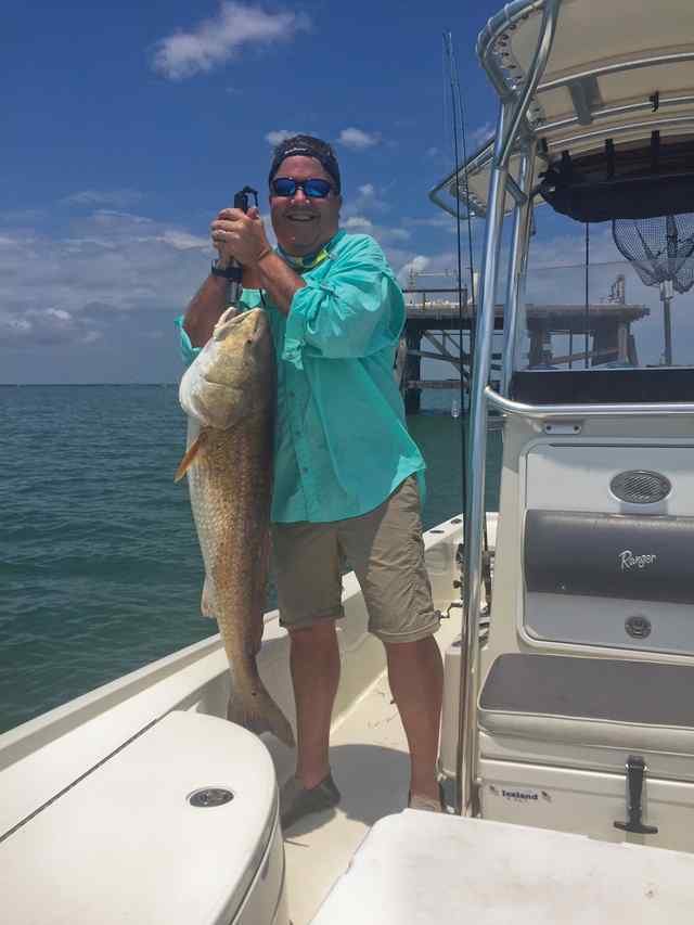 Cody Hedgpeth Aransas Bay - 43" bull red, just off one of the small oil rigs a mile or so off Key Allegro