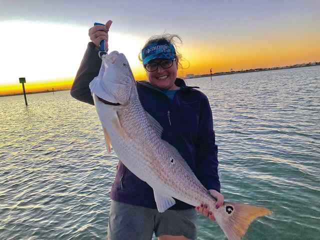 Candace Stapp near NAS Corpus Christi, caught on live shrimp under a popping cork - 38" redfish