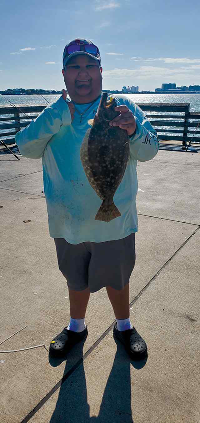 John A Lopez III Sea Wolf Park - 19.75" first flounder!