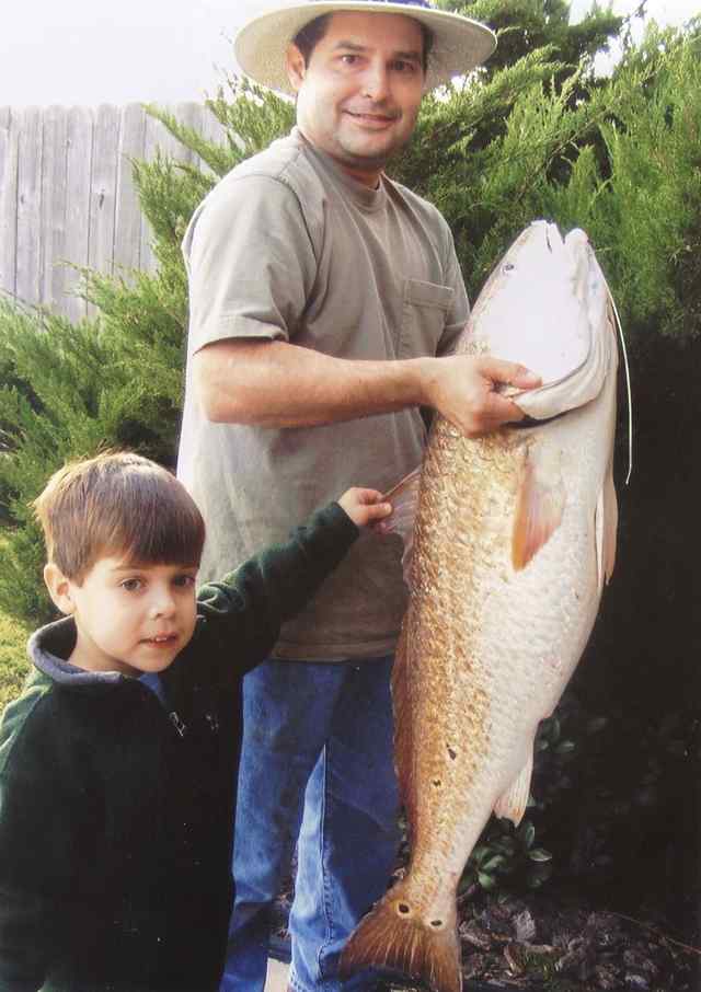 Father, Hector Luna and son, Ryan 41&quot; 25lb bull red, tagged